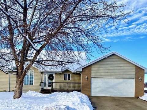 Exterior of the home with an attached 2 stall garage! 