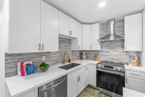 There are stainless steel appliances including an impressive double door fridge with an ice maker.