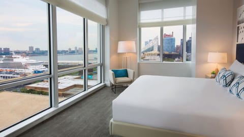 Unwind beside floor-to-ceiling windows with calming waterfront panoramas