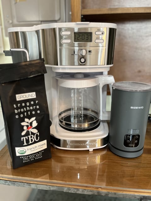 Coffe bar,  full pot and single cup brew,  milk frother , complimentary coffee 