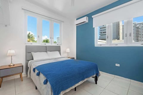 Modern renovated bedroom, huge double bed, soft bedding, bright, window views, airconditioner, modern table lamps