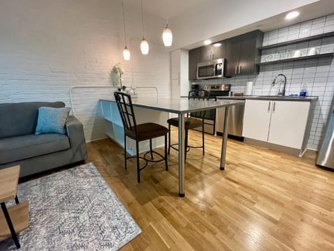 Eat in kitchen with stainless steel appliances and furnished kitchen in 408