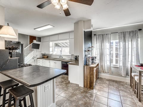 The kitchen provides for some less formal seating.