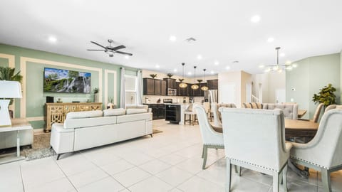 Eat, play, relax! Comfy living meets stylish dining in this open space.