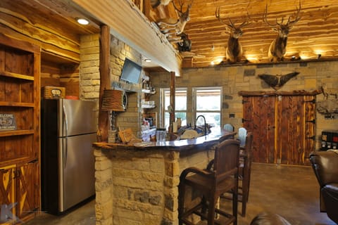 Kitchen complete with pots and pans and dishes in rustic and classy house