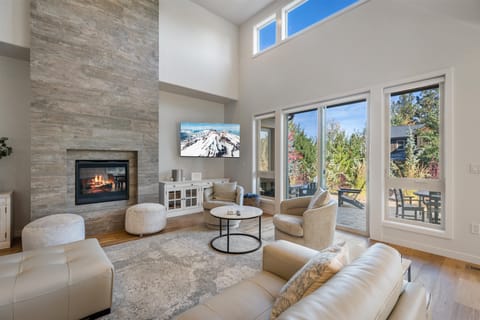 Huge great room with fireplace and TV!
