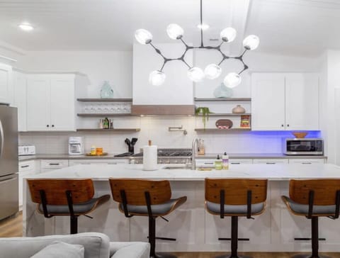 Welcome to this luxurious mid-century modern ranch where your ABODE awaits!