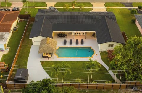 Stunning villa with a large heated pool and backyard for kids.