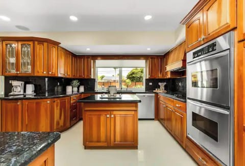 Fully equipped kitchen with all stainless-steel appliances. 