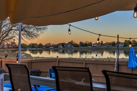 Backyard twilight w/ view of Lake & Pool. You can walk around the lake, about 1.5 miles. The most serene location with views of both city, mountains and the lake. You will love our brand new BBQ both gas & charcoal grill you can use for your favorite fami
