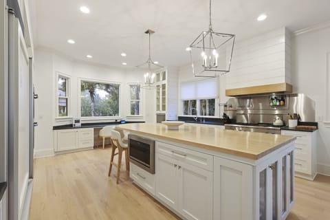 A fully-equipped kitchen, with ample counter space to accommodate all of the home chefs in the group.