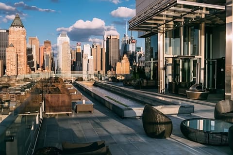 Lounge in style beside the sleek rooftop lap pool.