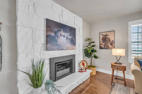 Fireplace is adorned with Southwestern Designer Art