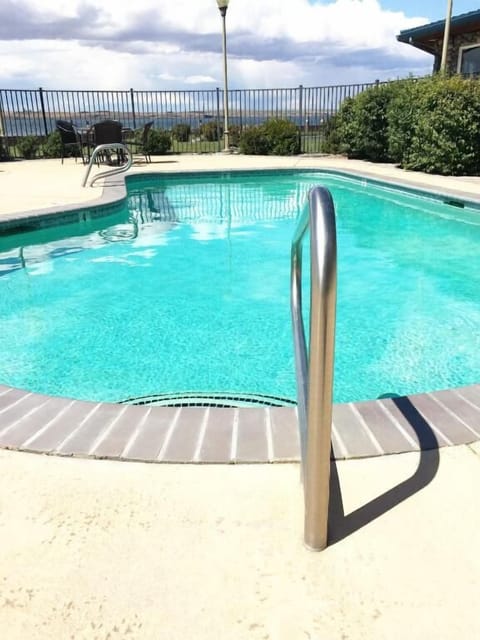Refresh with a cool swim beside serene lakeside breezes.