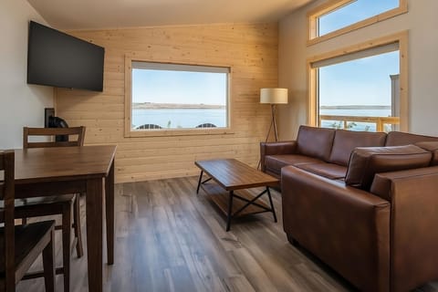 Gather for sunset conversations beside wide-open lake views.