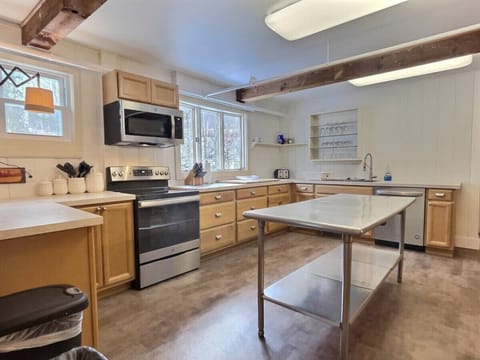 Whip up a memorable meal in the large kitchen with commercial fridge