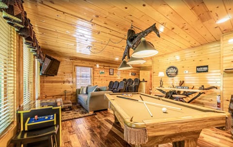 Game room with pool table and multicade