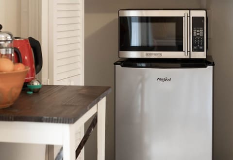 Small fridge and microwave help make this a self contained studio.....