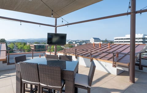 View Roof Terrace with Dining, Lounge, BBQ, TV for your enjoyment.