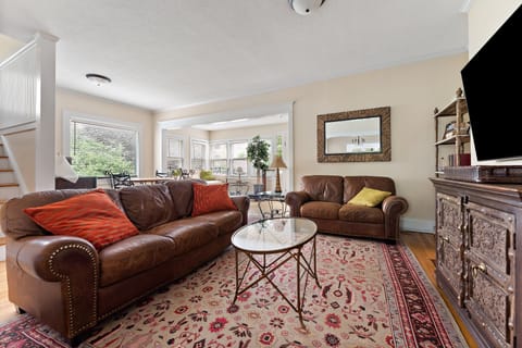 Cozy living room with 65" smart TV.