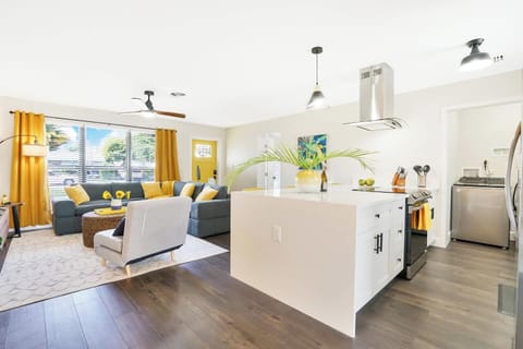 With plenty of natural light, you can cook up a storm while still being a part of the action. Whether you're watching TV or chatting with loved ones, you won't miss a moment of the fun in this welcoming and inviting space.