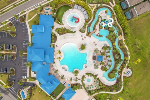 Aerial view of the water park – lazy river, slides, and sunshine await!
