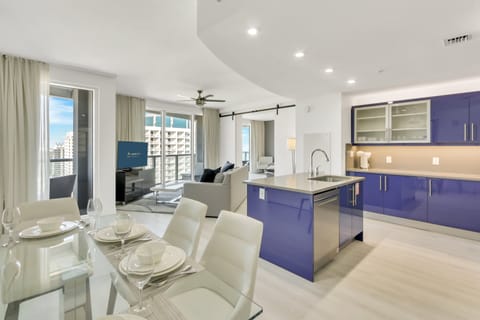 Layout | Modern, open-concept living space, balcony access, and windows galore.
