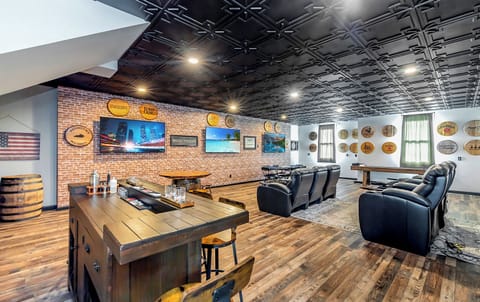 Step into this luxurious game room in your countryside retreat, complete with bourbon barrels from local distilleries. Play poker, shuffleboard, and more for the perfect evening of fun and relaxation.