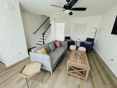 Enjoy a nicely decorated living room with plenty of seating and natural light.