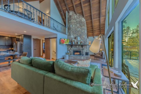 Living room with wood burning stove fireplace (firewood is NOT provided).