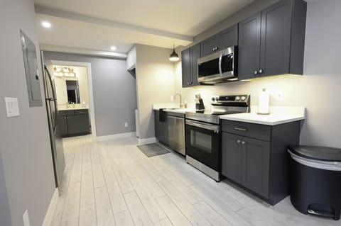 Full kitchen with Stove, oven, microwave, large refridgerator, Dishwasher. 