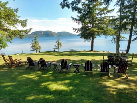 View of lawn and Rogers Rock from interior porch
