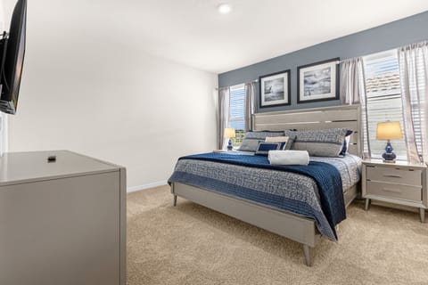 This is one of the 4 master bedrooms of this home! Every room has their own TV!