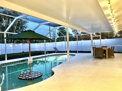Heated Pool w/ built-in table and bench   6 Person dining and 2 loungers