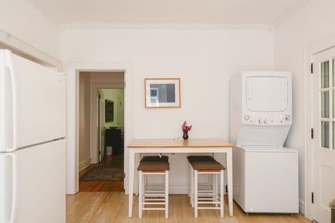 Table, Washer & Dryer in Kitchen
