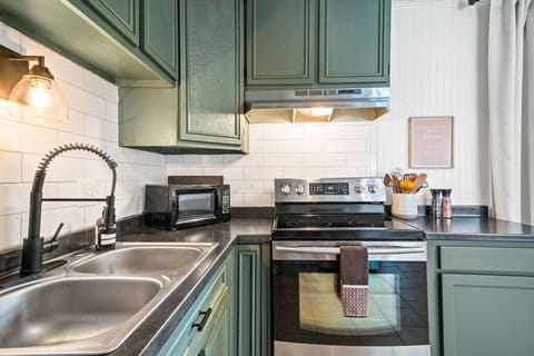 Cook with ease in a fully stocked kitchen designed for comfort and connection.