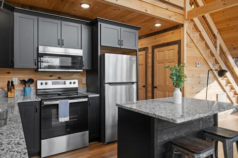 Enjoy granite countertops and updated appliances when staying at Midnight Ridge Lodge.
