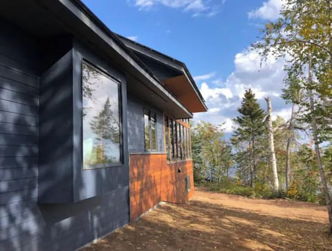 Lakeside view along house.