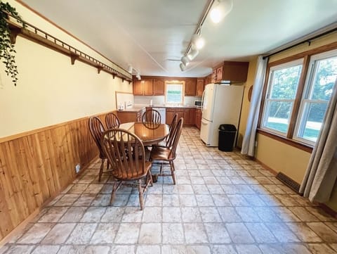 Dining area, kitchen.