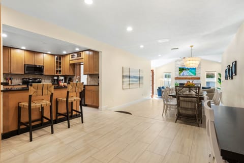 From family breakfasts to evening dinners, this open-plan kitchen and dining area sets the stage for memorable moments together.