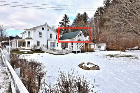 Ski VT overlooks large backyard boasting 3 season fire pit and views of the Ottaqueechee River (Note: We just purchased this property. Please excuse our outdoor appearance at the moment - it is undergoing some aesthetic changes like a sign change, new paint in some areas, etc. However, please rest assured the interior is completely designed, furnished and is well represented in the listing photos)