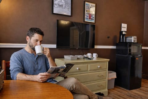 Kitchenette area features complimentary coffee, creamer and sugar, as well as a mini-fridge, toaster and microwave.