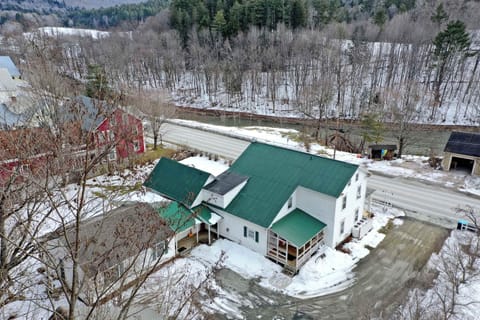 Directly across the street from the Ottauquechee River