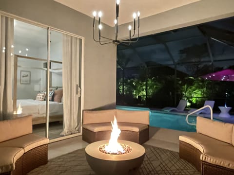 Master suite opens seamlessly to pool and lanai 