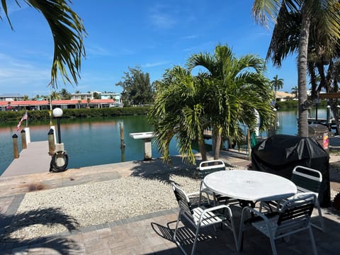 Canal side view of patio and villa. 40' dock on Key Colony Beach's largest canal