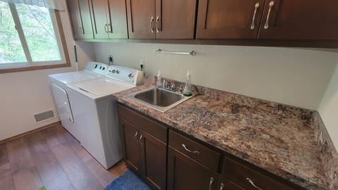 Laundry room with washer and dryer is fully accessible and free to use.