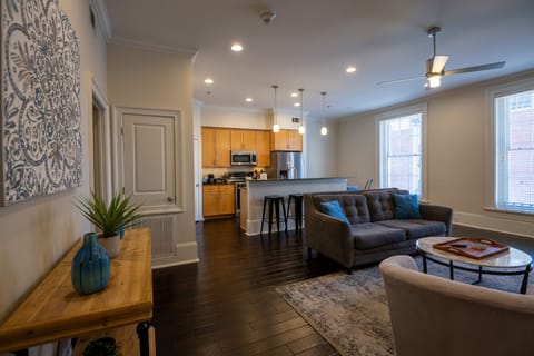 Enjoy a comfortable stay with ample seating & a large TV for your entertainment.