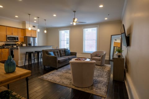 Enjoy a comfortable stay with ample seating & a large TV for your entertainment.