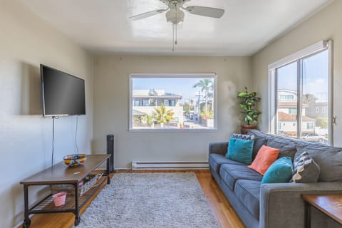 Comfy living room with plenty of San Diego sun light