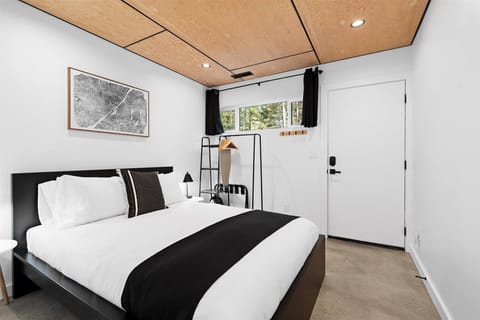 Queen bedroom at entrance to the cabin